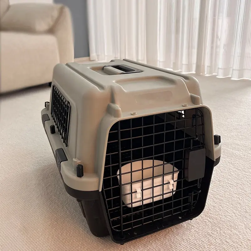 Boîte de transport pour chiens approuvée par la compagnie aérienne en plastique IATA Cages pour animaux de compagnie Caisses de voyage Chenil