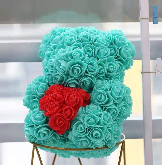 fat blue bear with red heart with box