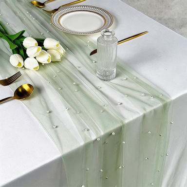 Green gauze and white beads