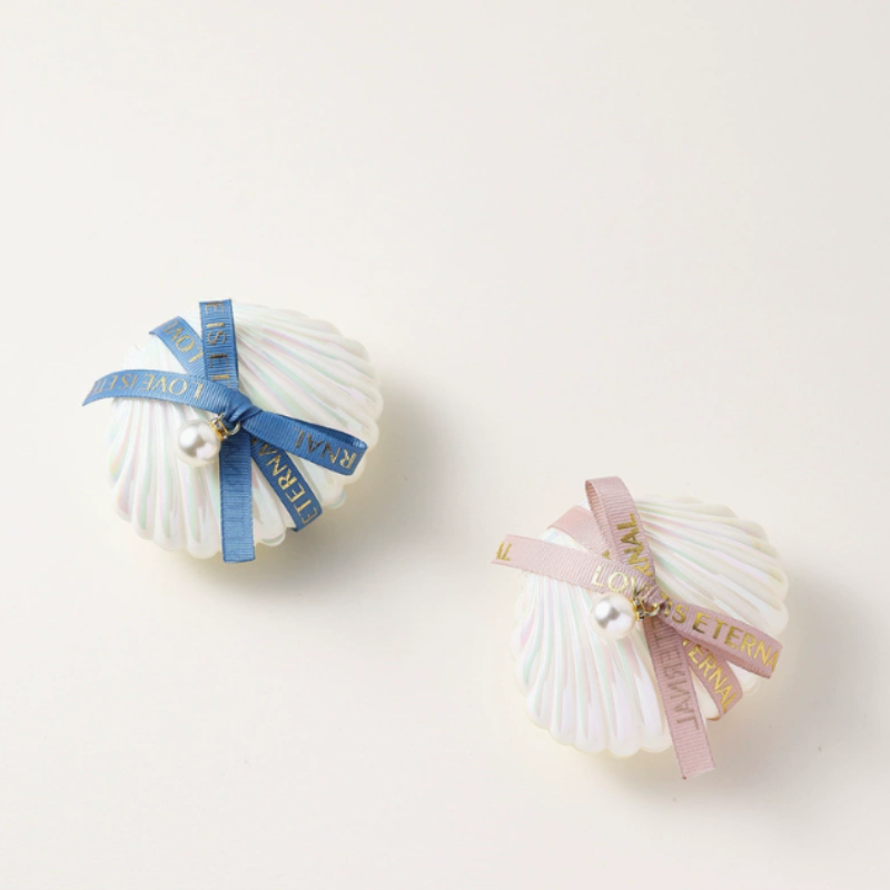 Concha de Cinta Azul + Vela de Aromaterapia