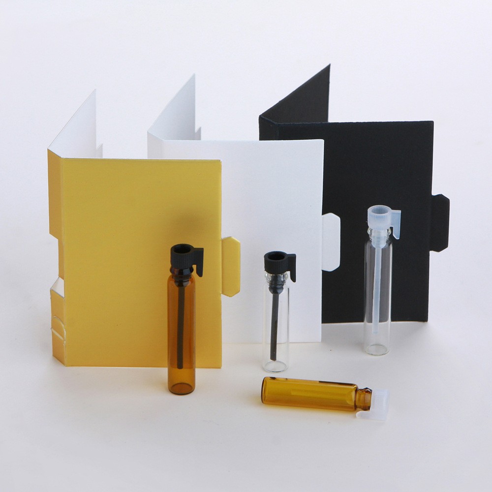 Amber glass bottle + black cap + white paper card