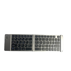 The Mini <strong>Wireless</strong> <strong>Numeric</strong> <strong>Keypad</strong> Can Be Folded in Half for Convenient Carrying - Product Image 1