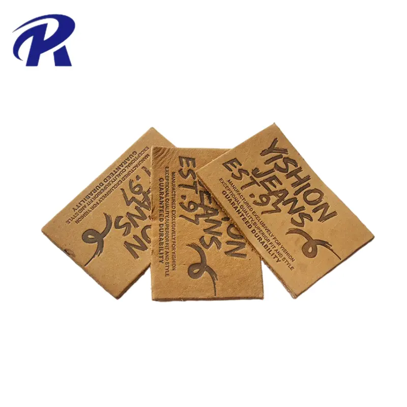 Étiquettes en relief en cuir PU personnalisées de haute qualité prix d'usine Logo en relief personnalisé