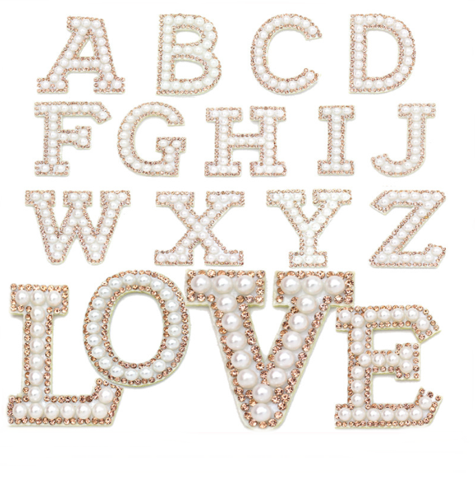 Strass doré + perle blanche