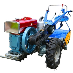 畅销农机两轮手12HP 13HP 15HP手持手扶拖拉机在拖拉机后面行走