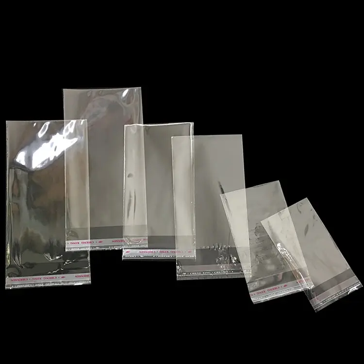 Bolsa de plástico autoadhesiva transparente, color blanco, diferentes tamaños, decoración de joyas, paquete de ropa