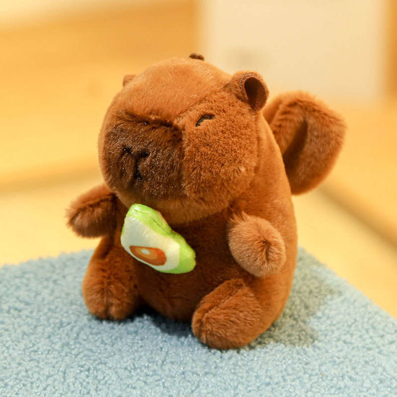 Ange tenant un avocat 12cm