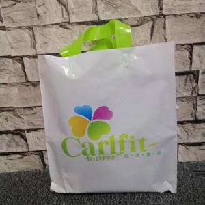 広州工場カスタム再利用可能な印刷されたカラフルなプラスチック製カスタムロゴショッピングバッグ、ソフトループハンドル付き - Product Image 1