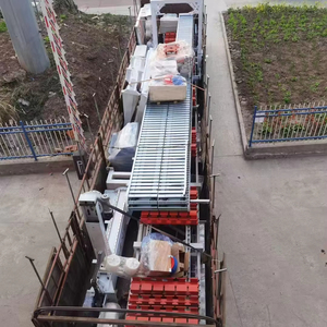Sistema automático de cubado de apilador de bloques paletizador de ladrillos para núcleo de línea de producción de ladrillos Incl. Máquina de fabricación de bloques de pavimentación - Product Image 1