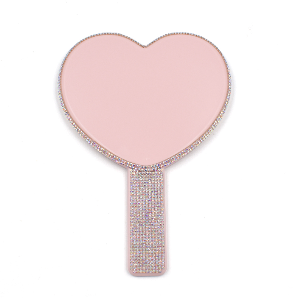 Espejo de corazón rosa