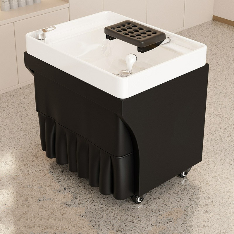 Lavabo con cabezal móvil