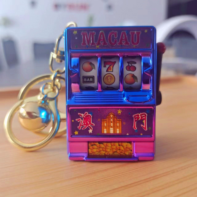 Boucle en or violet Macao, clochette dorée.