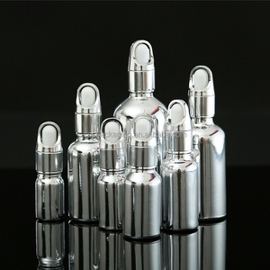 Vidro de prata óleo essencial, <span class=keywords><strong>5ml</strong></span> <span class=keywords><strong>10ml</strong></span> <span class=keywords><strong>20ml</strong></span> <span class=keywords><strong>30ml</strong></span> 50ml 100ml embalagem cosmética soro bomba de loção spray atomizador garrafa