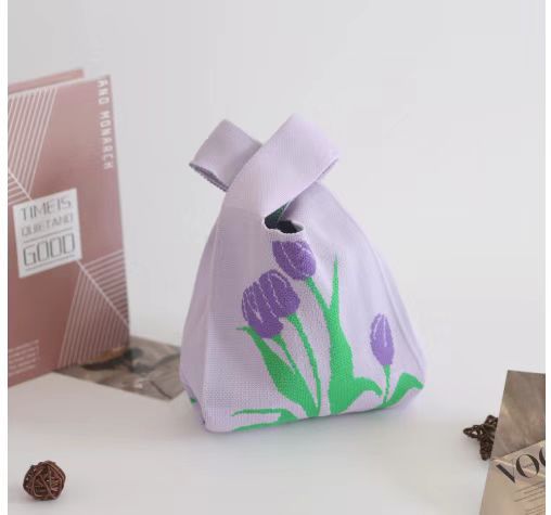 Four purple tulips