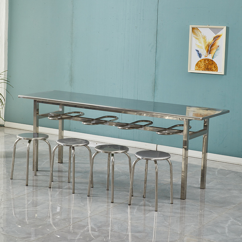 One table and eight round stools