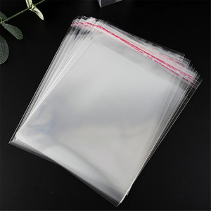 定制印刷自封胶塑料透明头opp袋，用于带挂孔卡的衣服包装 - Product Image 1