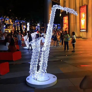 Iluminação comercial, parquet exterior, decoração da rua, instrumentos musicais de led, natal, 3d