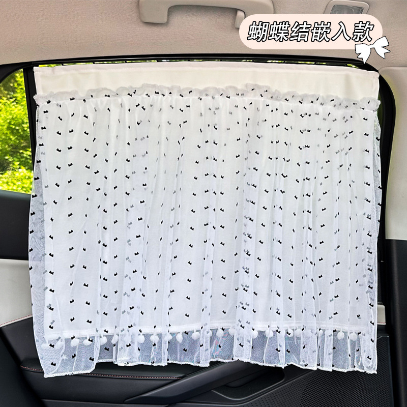 White double-layered bow curtains with embedded pom-poms