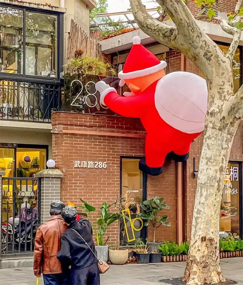 कस्टम बिल्डिंग रस्सी विशाल inflatable Santa क्लाकस चढ़ाई खिलौना उपहार के साथ क्रिसमस के लिए कस्टम मॉल प्रकाश पिता सांता क्लॉस