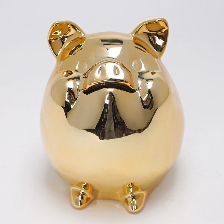 Cochon assis doré