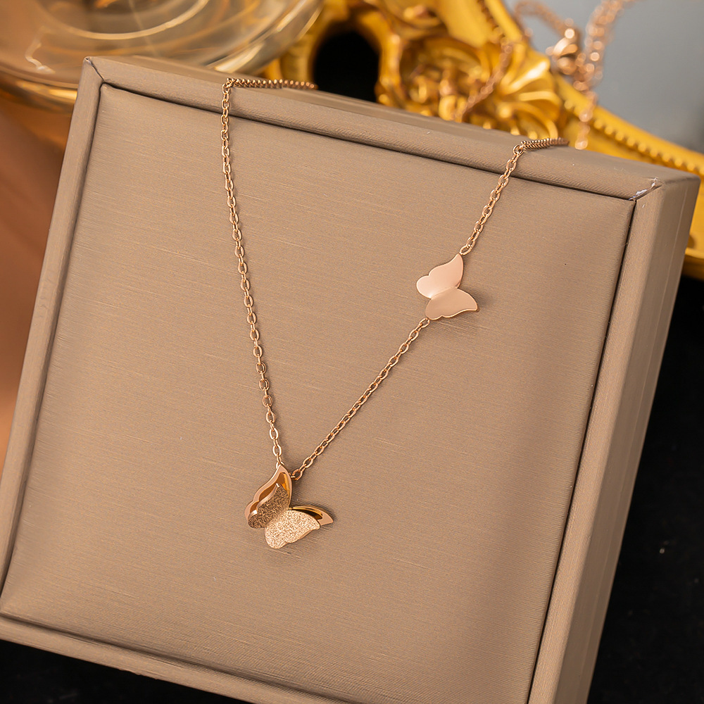 Collier papillon X909 or
