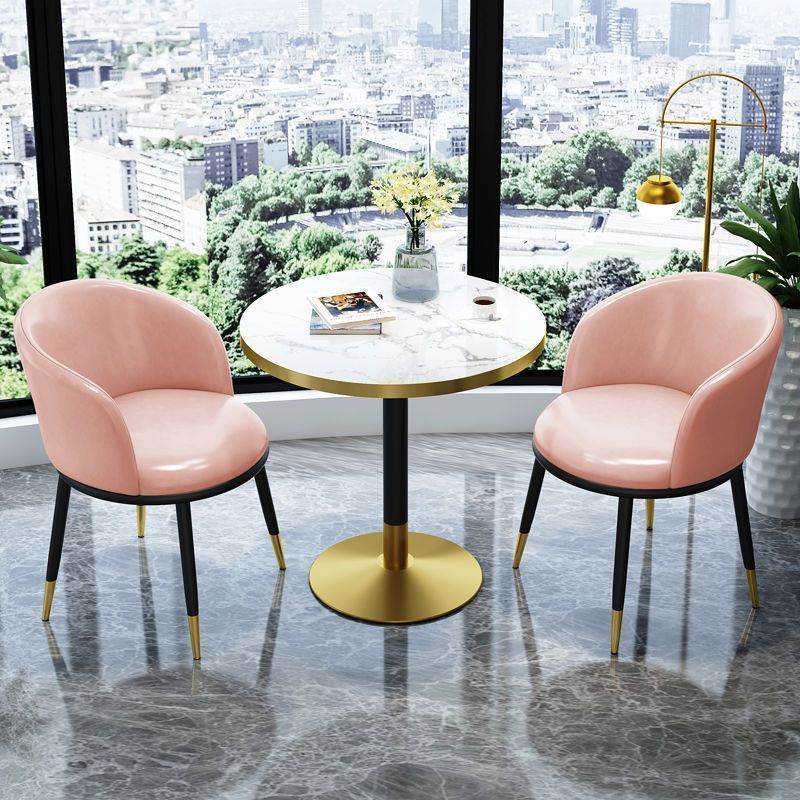 Pink leather chair imitation stone round table