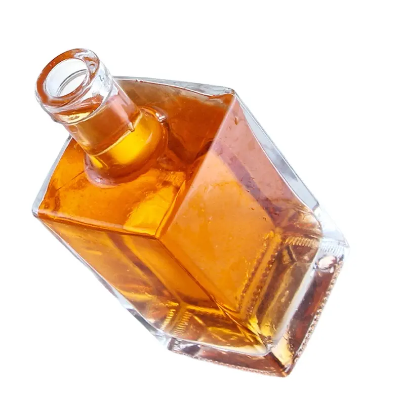Venta al por mayor de botellas vacías de vidrio esmerilado para licor de 500ml 700ml con tapa