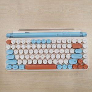 Lindo teclado Bluetooth Delgado Estilo mecánico Modo dual 2,4G Inalámbrico Bluetooth Teclado de tecla redonda para iPad con ranura para tarjeta - Product Image 3