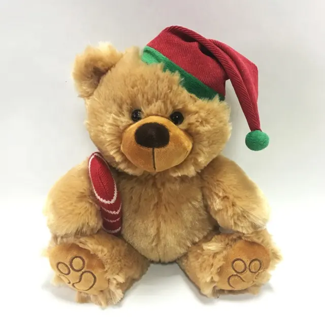 Weihnachten ausgestopft Plüsch tier sitzen Weihnachten Teddybär mit Weihnachts mann Hut und Süßigkeiten für Weihnachts dekoration