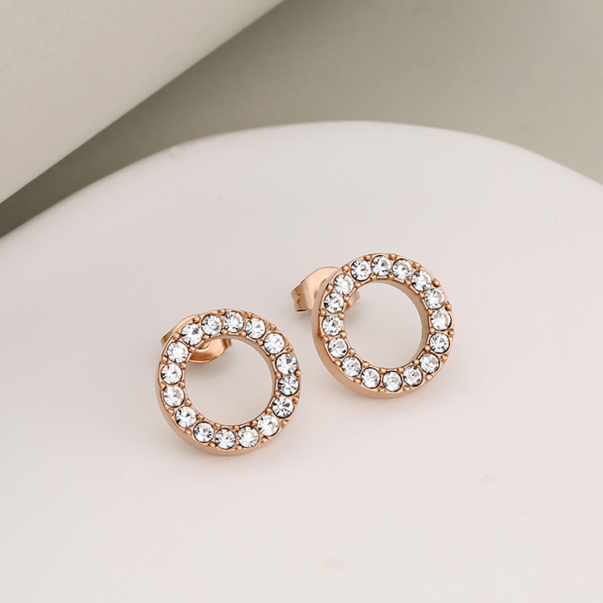 Rose gold and white rhinestone earrings