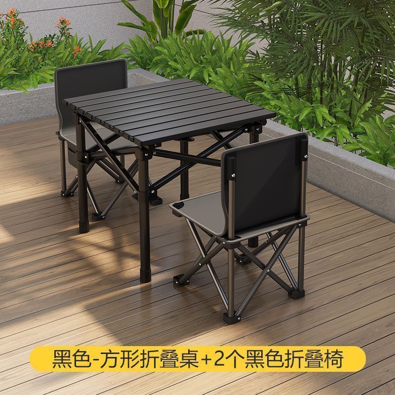 Black and silver colored 52cm square table and two 36cm folding chairs