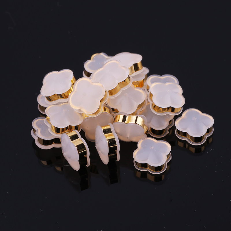Trèfle à quatre feuilles cerclé d'or 18 carats