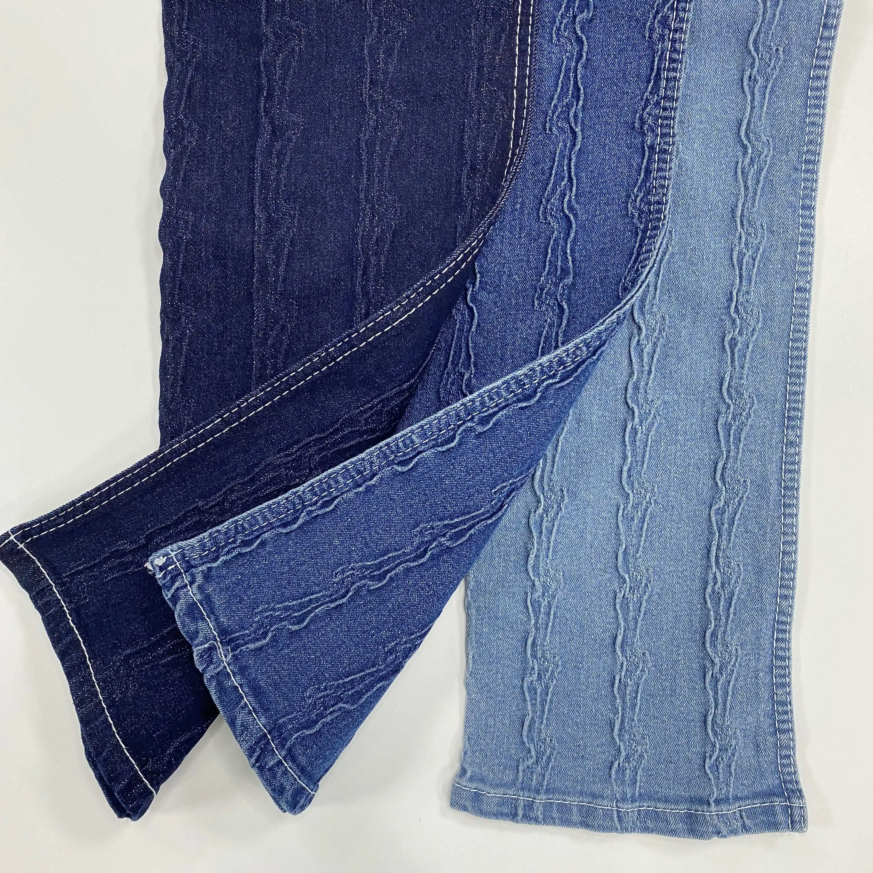 Jeans da uomo tessuto elastico in tessuto denim elasticizzato in cotone fiammato per jeans wrangler all'ingrosso