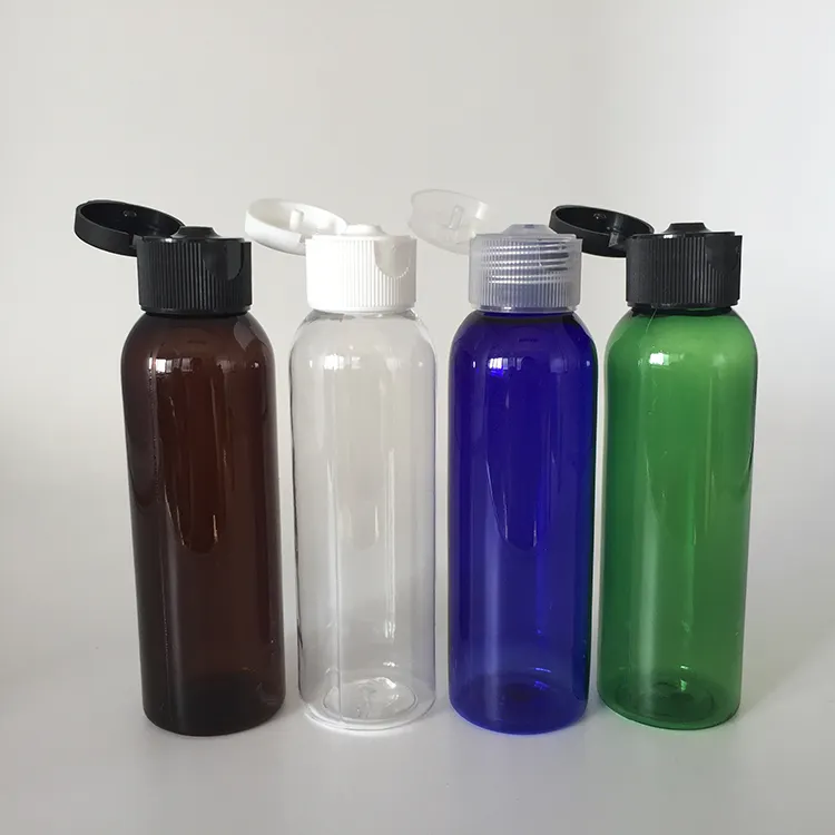 En Stock de plástico para mascotas de 60ml botella de 2 oz con tapa de tapa para el embalaje de cosméticos de maquillaje de aceite de agua loción viajes de vial