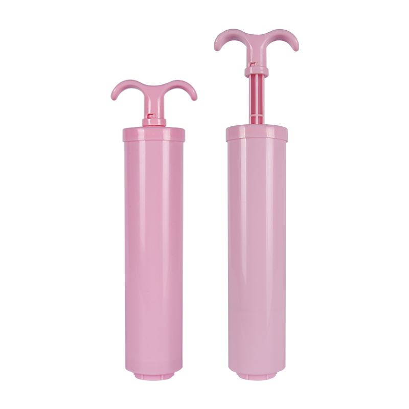 Pompe à main en plastique rose