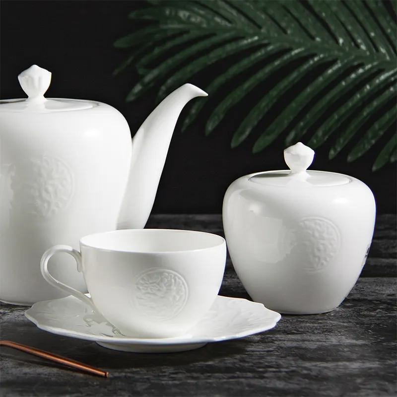 Royal Embossed Rose Design Ceramic Tea Cup and Saucer Set Luxury Porcelain White Coffee Tea Pot Set British Bone China Tea Set