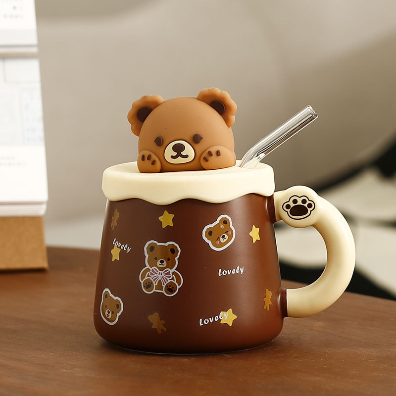 Funda estéreo con diseño de oso adorable y pajita.
