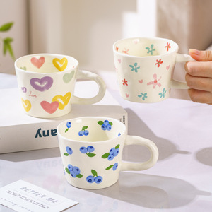 新しいクリエイティブなハンドヘルドセラミックコーヒーカップソーサーかわいい風セラミックカップ