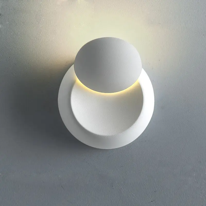 Nero bianco foro di ferro Design LED applique applique per interni 360 rotante eclissi lampada camera da letto comodino LED lampada da parete