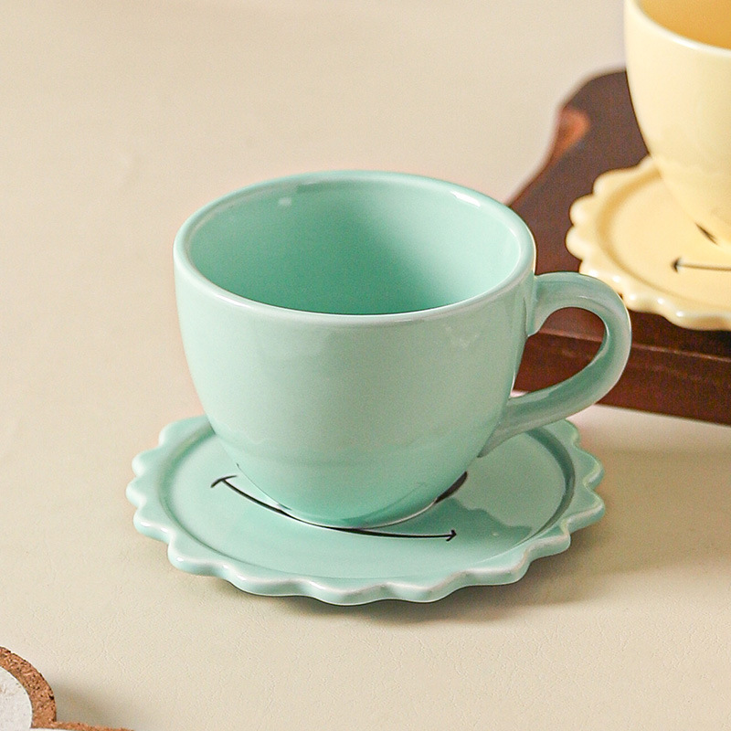 Green coffee cup and saucer set