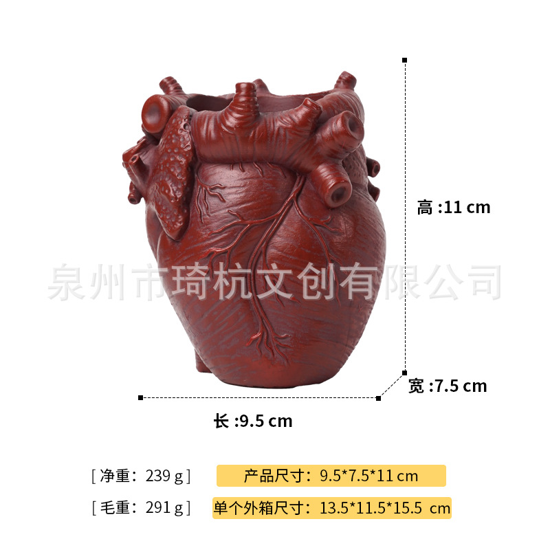 Heart-shaped pen holder - red