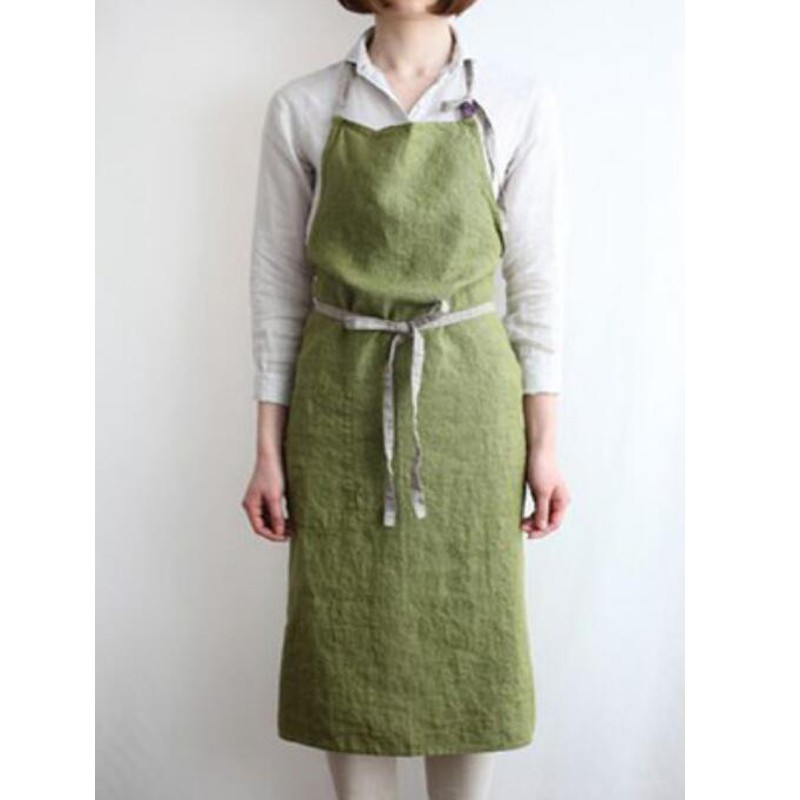 Tablier vert avec bretelles grises
