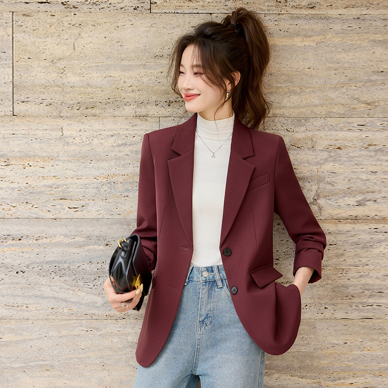 plum-colored suit