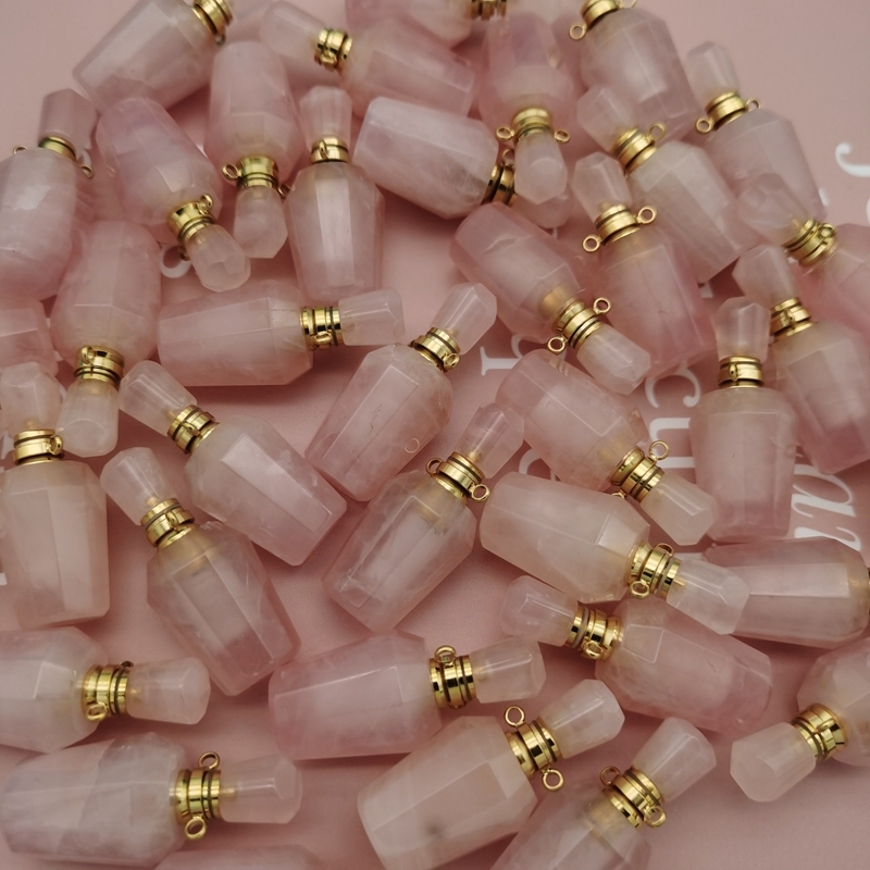Bouteille de parfum de quartz rose