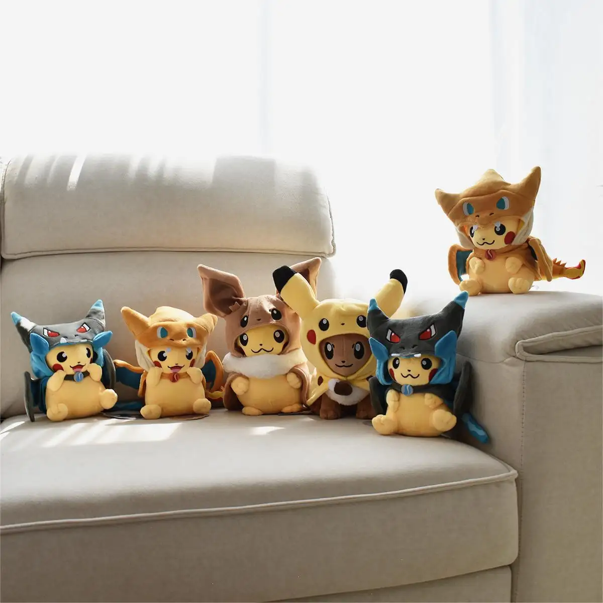 Toptan yüksek kalite çapraz soyunma Poke mon peluş 23cm Pikachu peluş dolması hayvan peluş çocuk hediye için