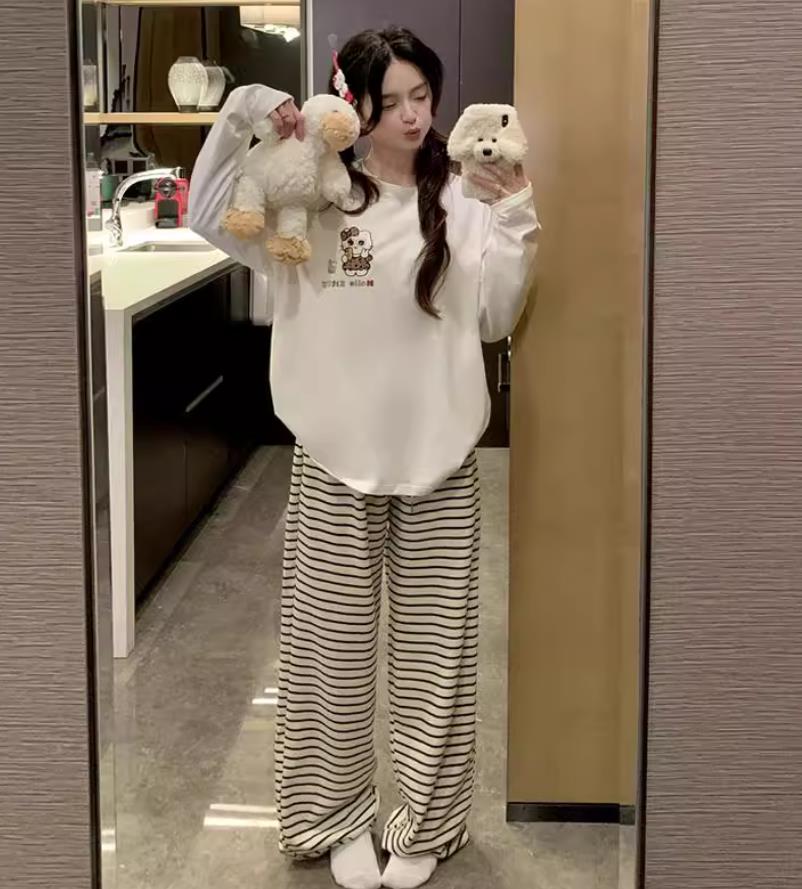 Estampado de leopardo blanco KT gato pantalones delgados doble largo