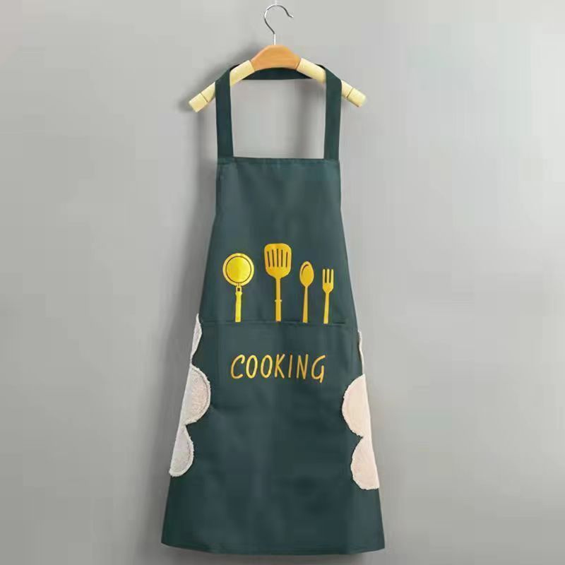 Estampado de utensilios verde oscuro con toallas para limpiar las manos.