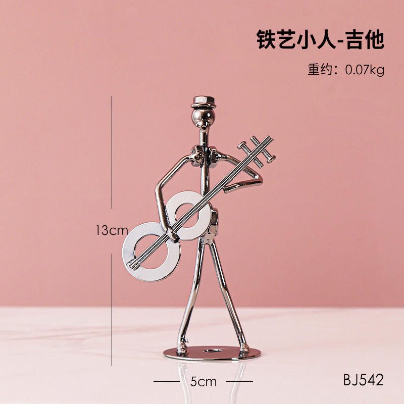 Wrought iron little man-guitar