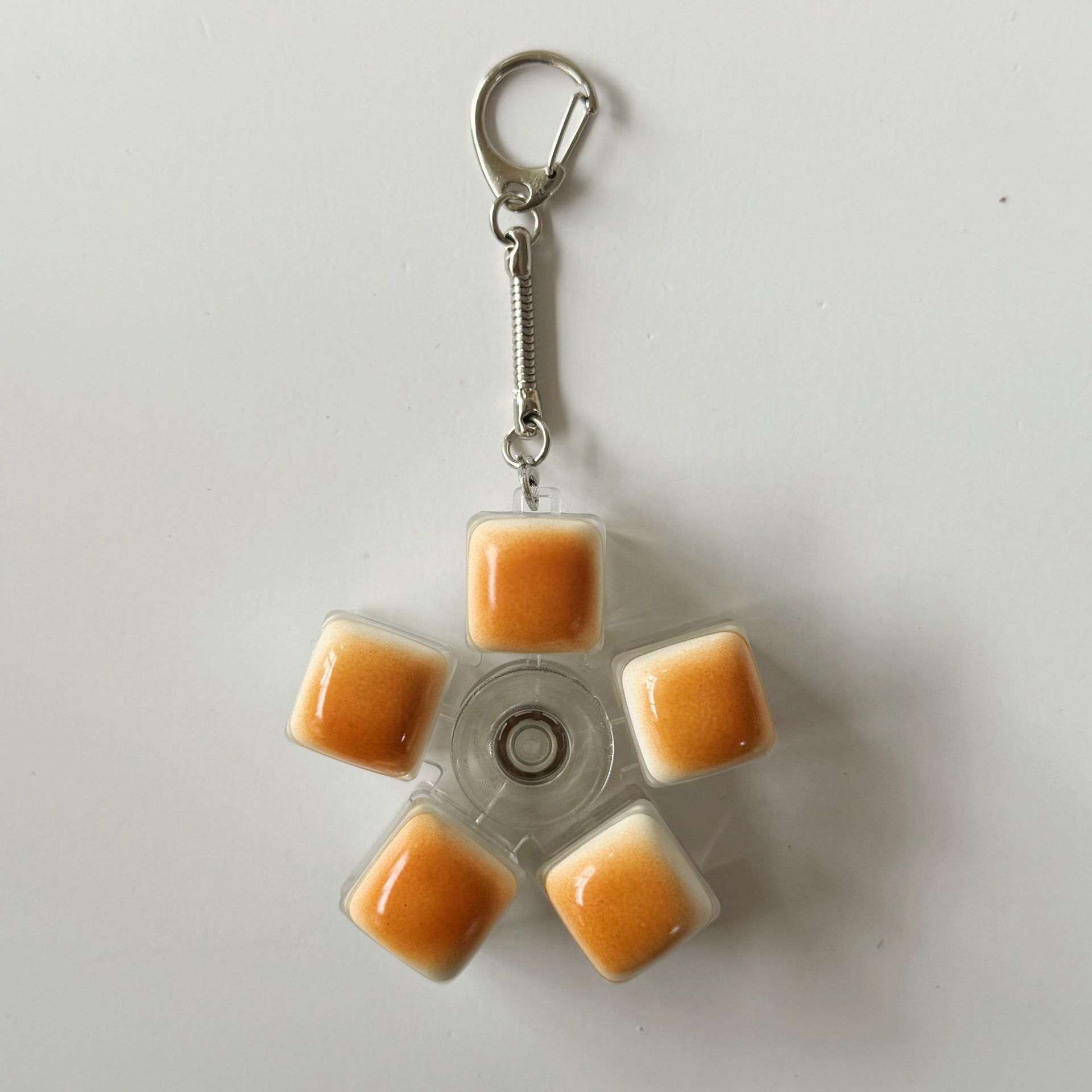 Caramel bread rotating button keychain