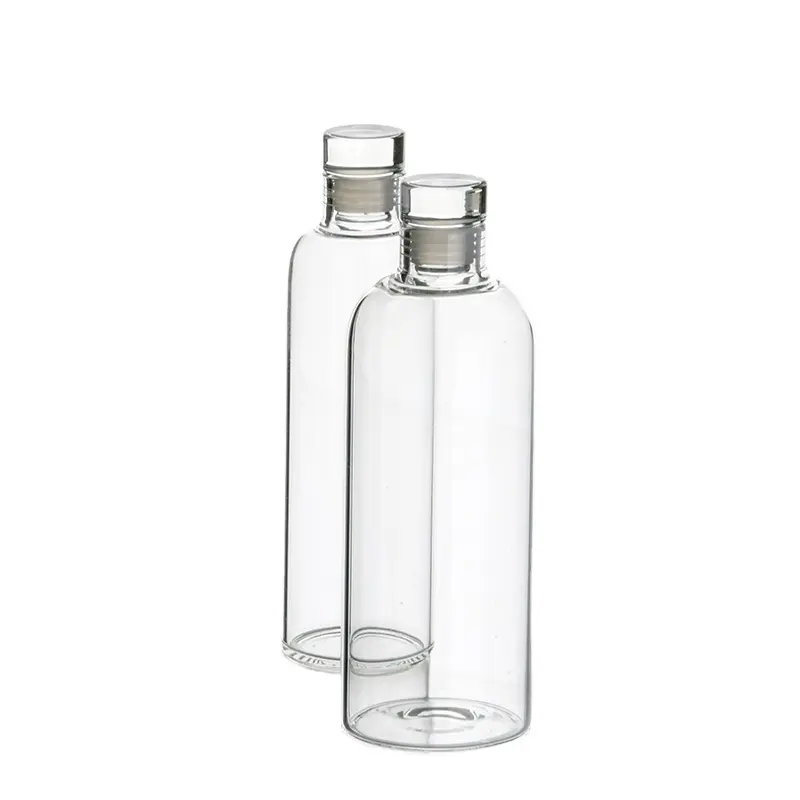 Bouteille en verre transparent avec Logo personnalisé à haute teneur en Borosilicate, bouteille d'eau en verre lisse de Style de luxe avec couvercle en verre étanche
